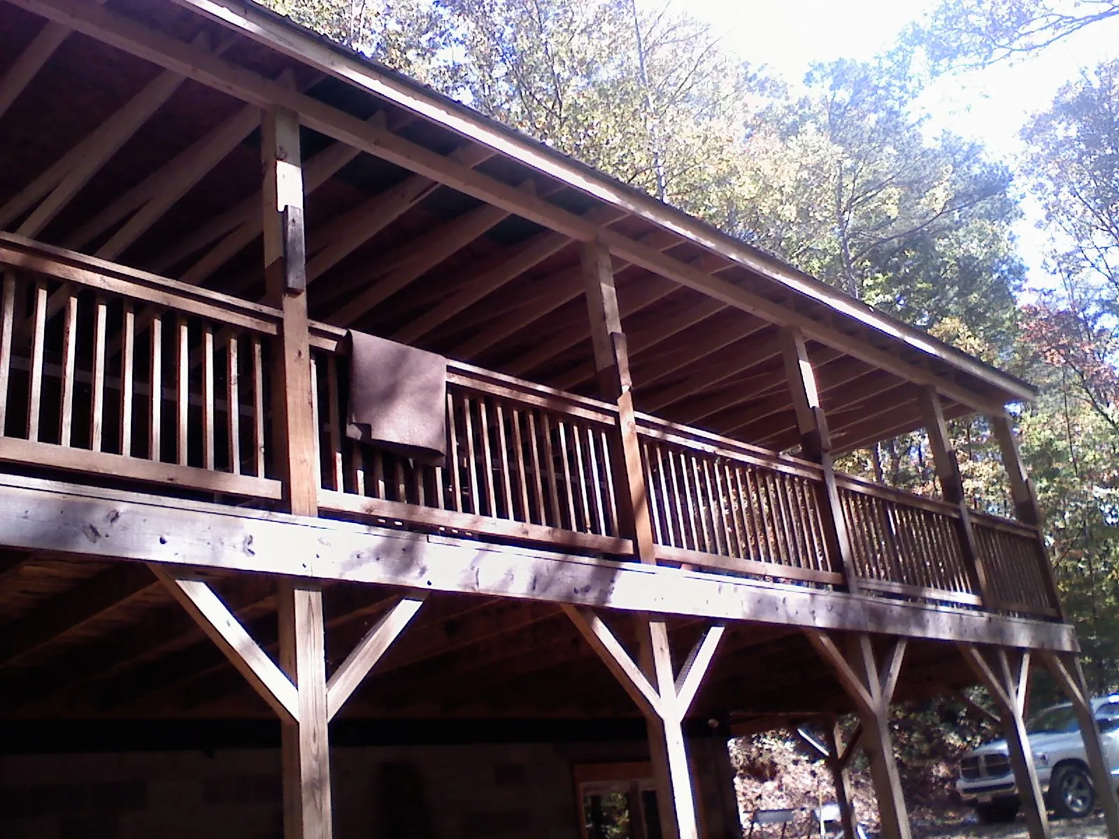 Timber framing under a new elevated porch and deck — Roof Leak Repair in Berlin Heights by Roofing Brothers